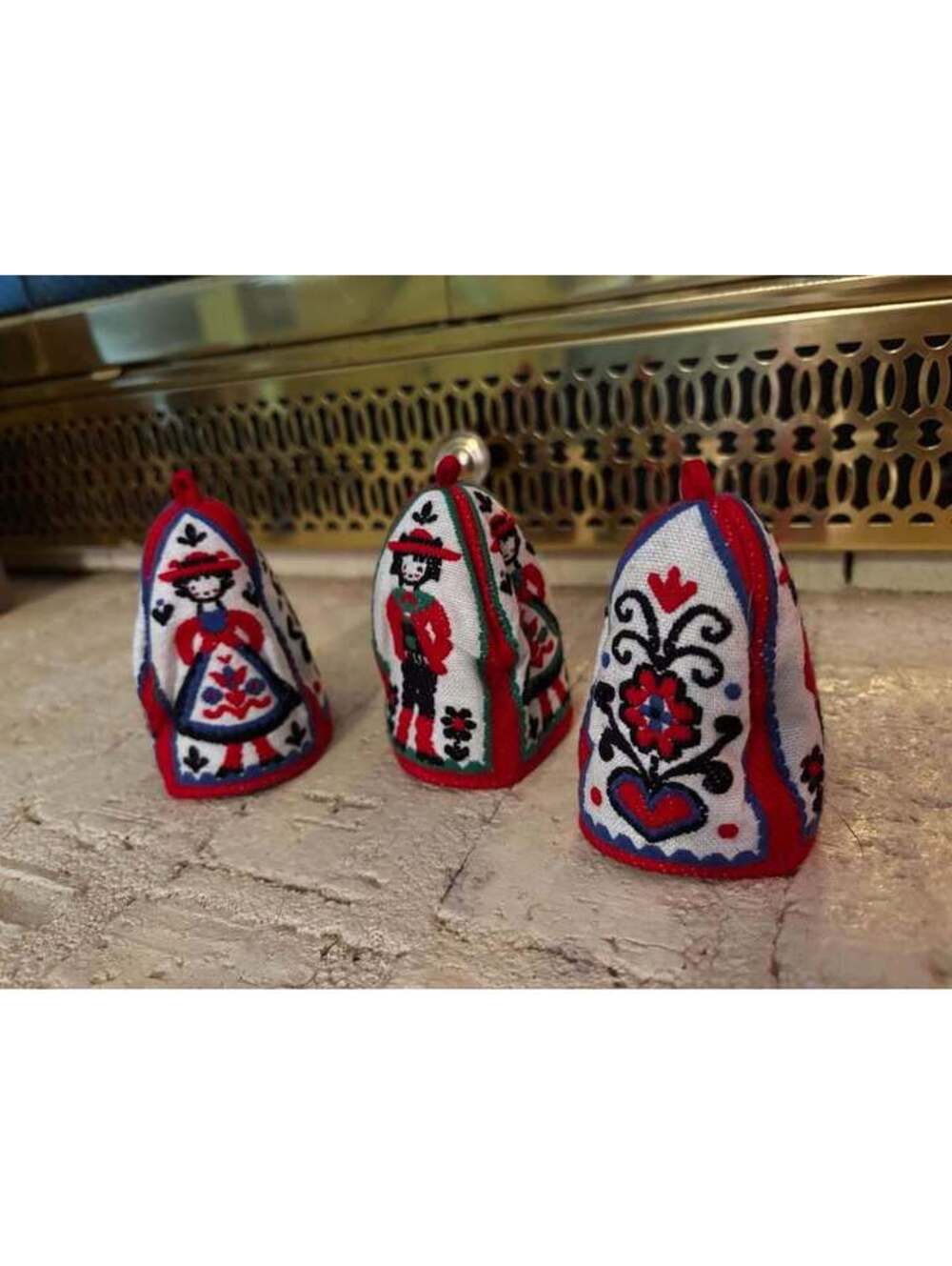 German golk art embroidered egg cozies